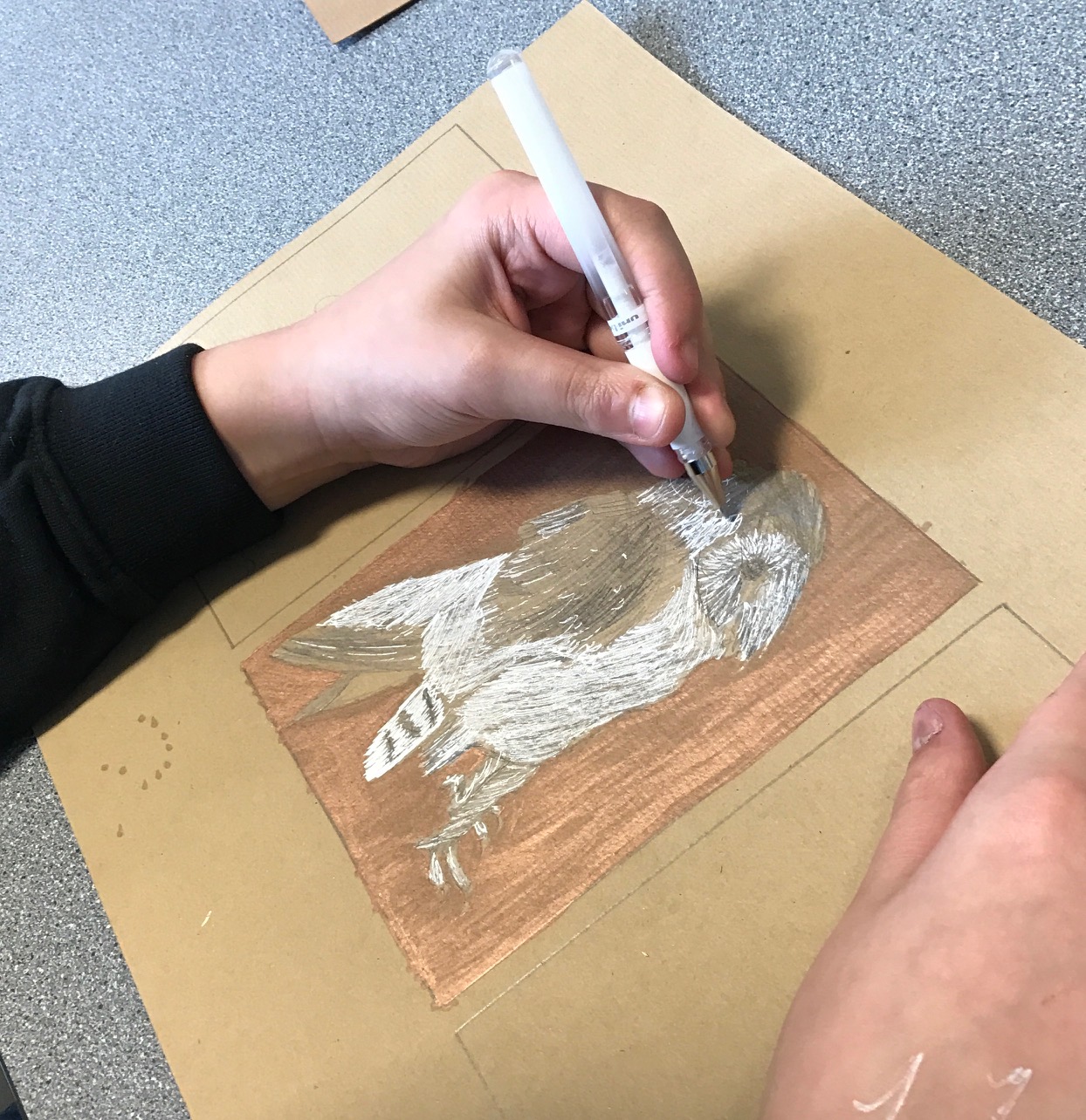 Picture of a child drawing an owl