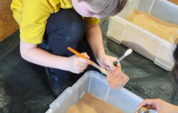 Photo of children working with sand