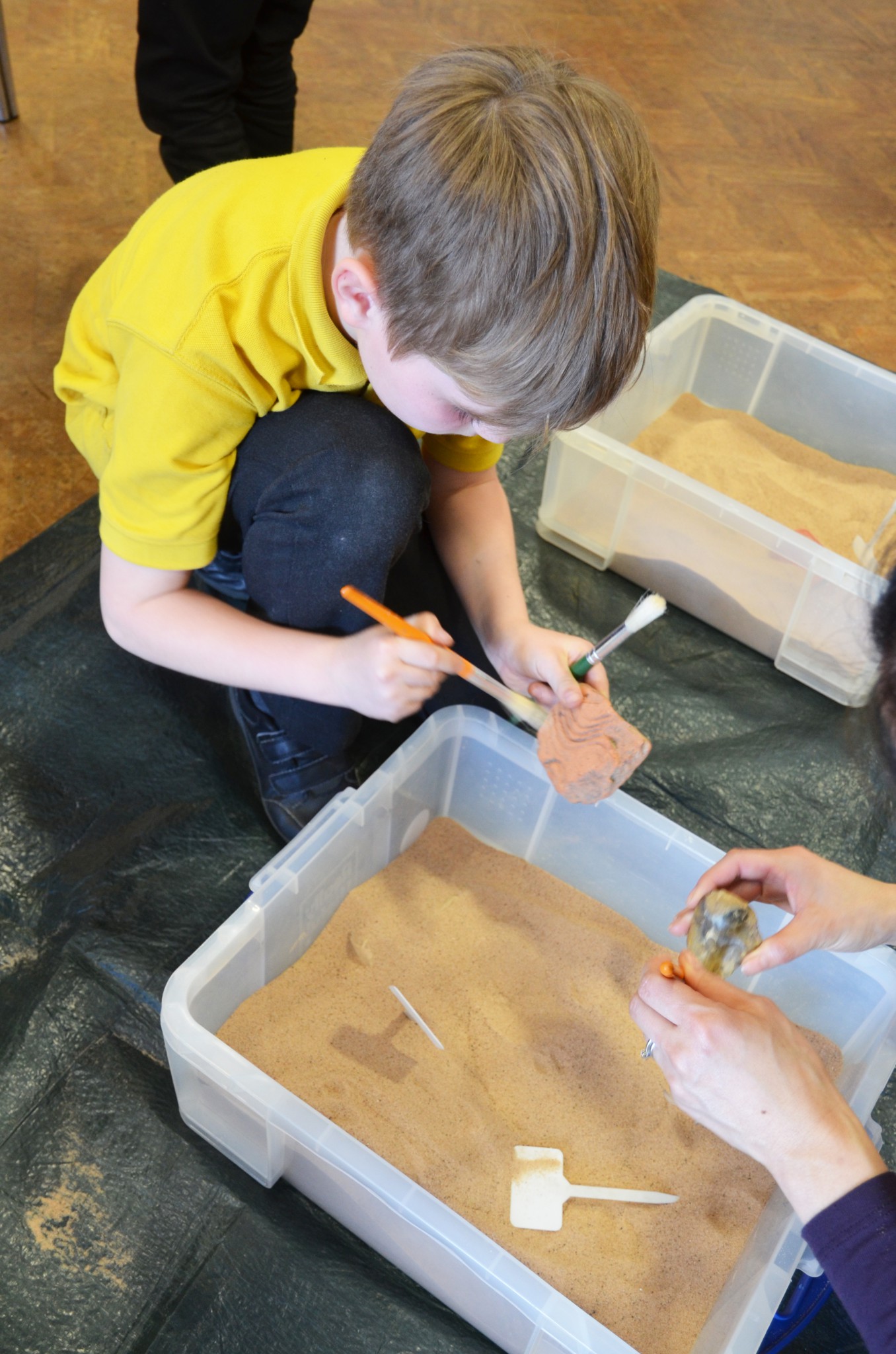 Photo of children working with sand