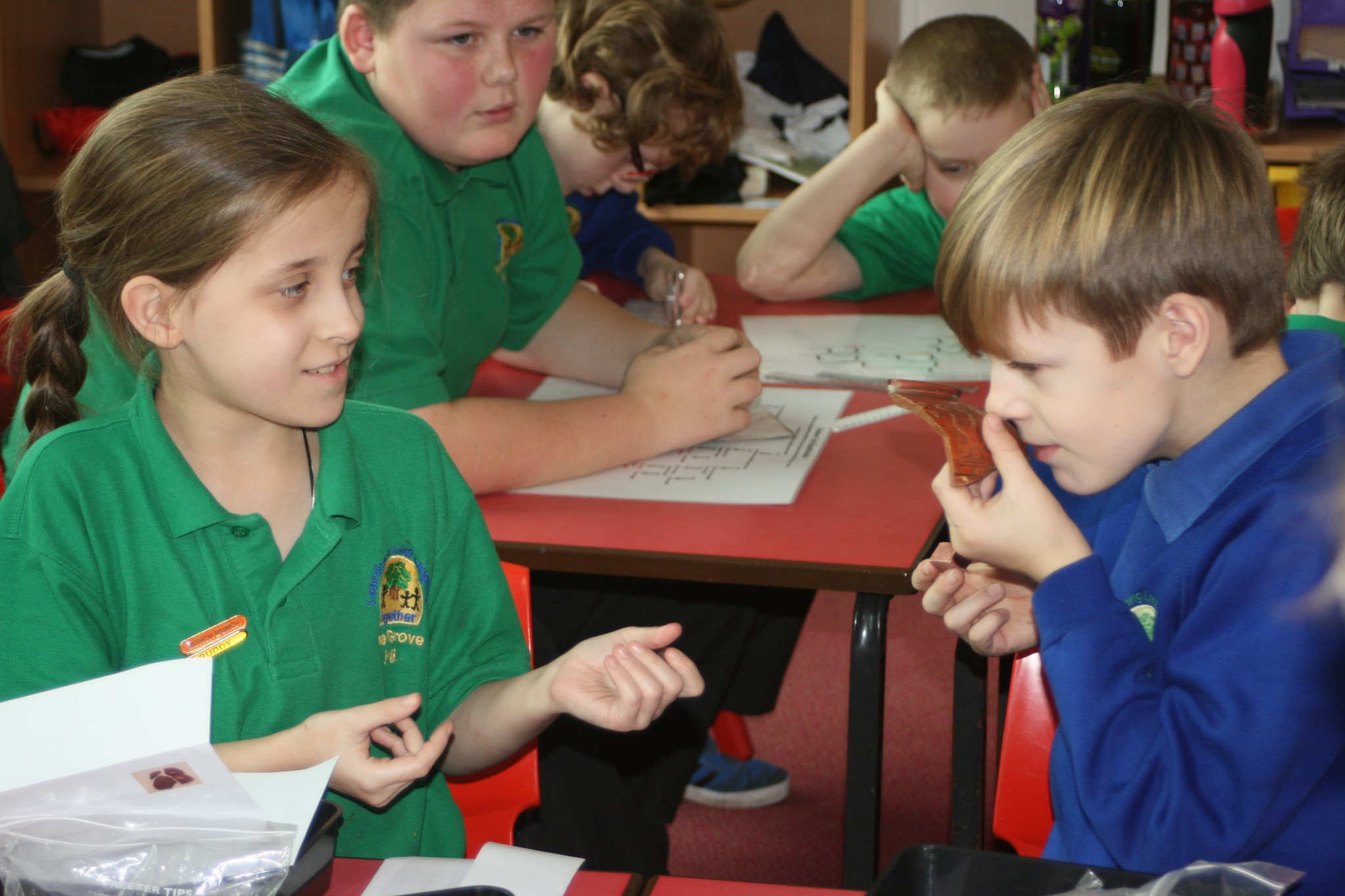 Photo of children working with artefacts