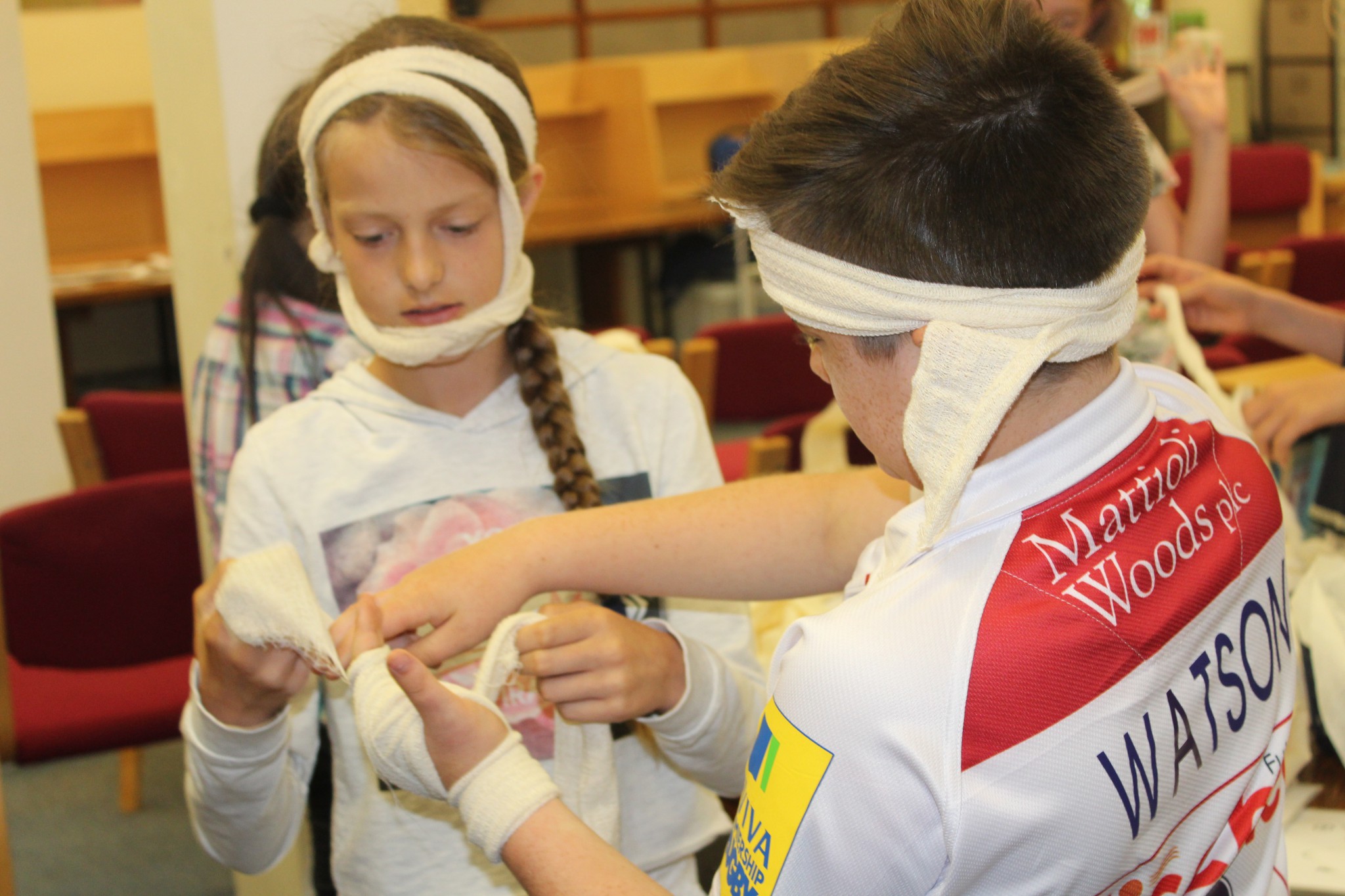 Photo of children using bandages