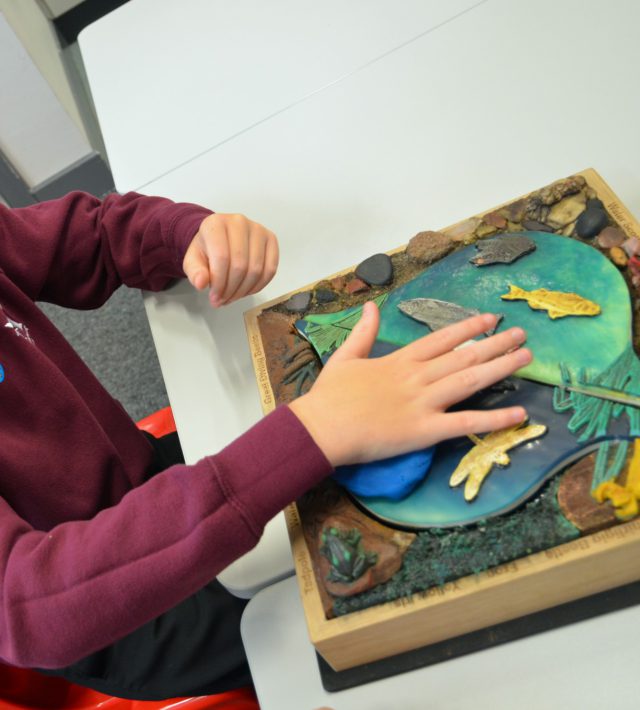 Boy using a Touch Tile