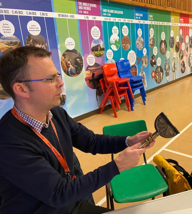 Photo of teachers using artefacts