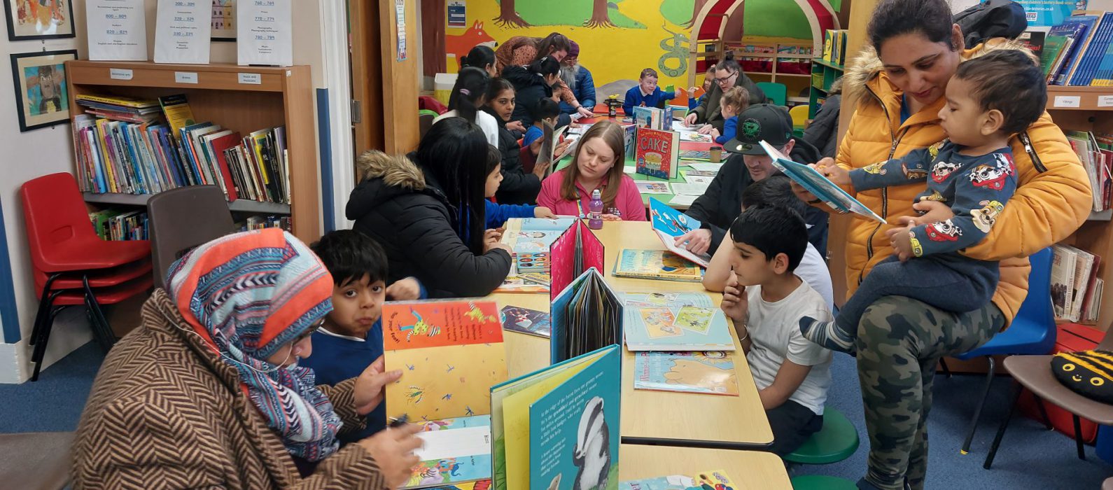 Photo of families reading