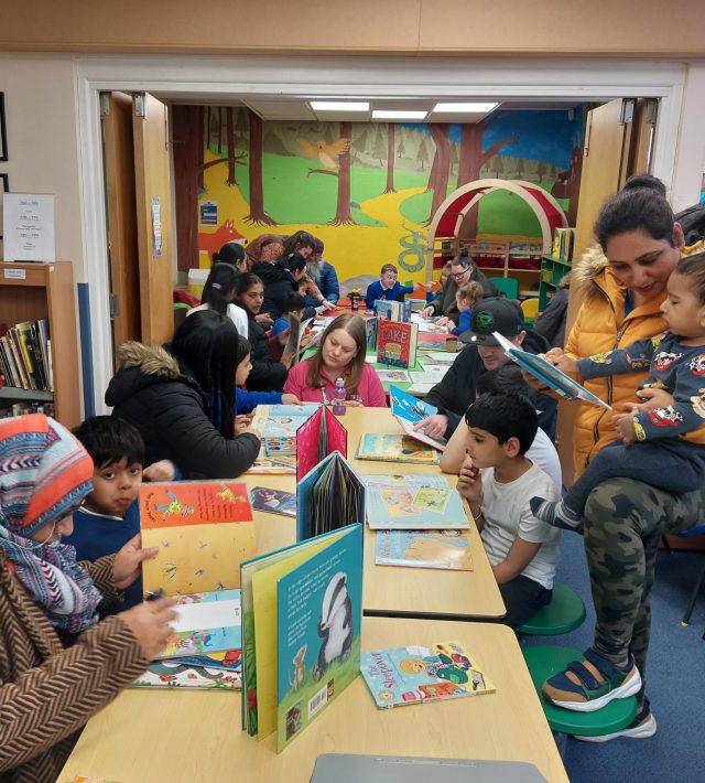 Photo of families reading