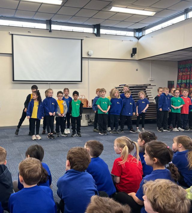 Children performing poetry