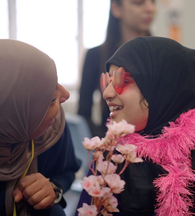 Image of child and teacher