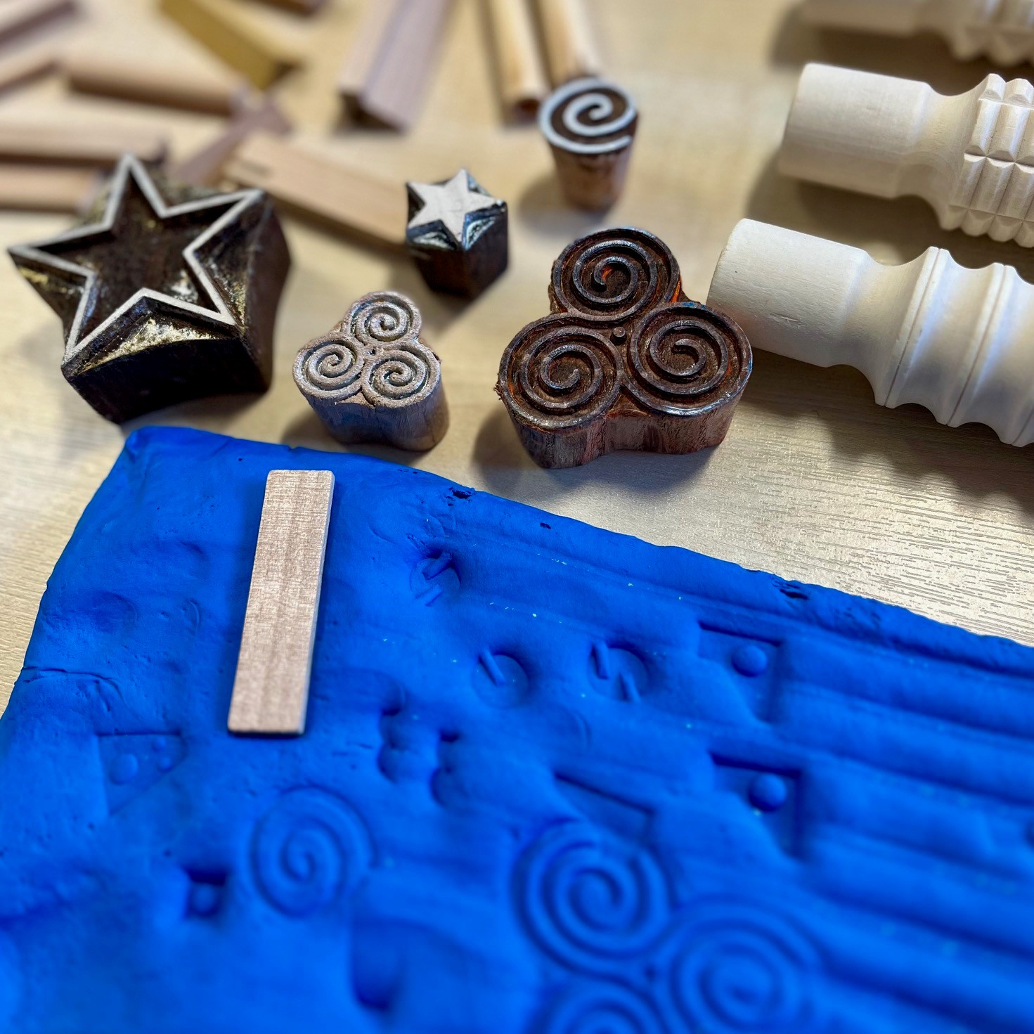 Image of blue modelling clay tile