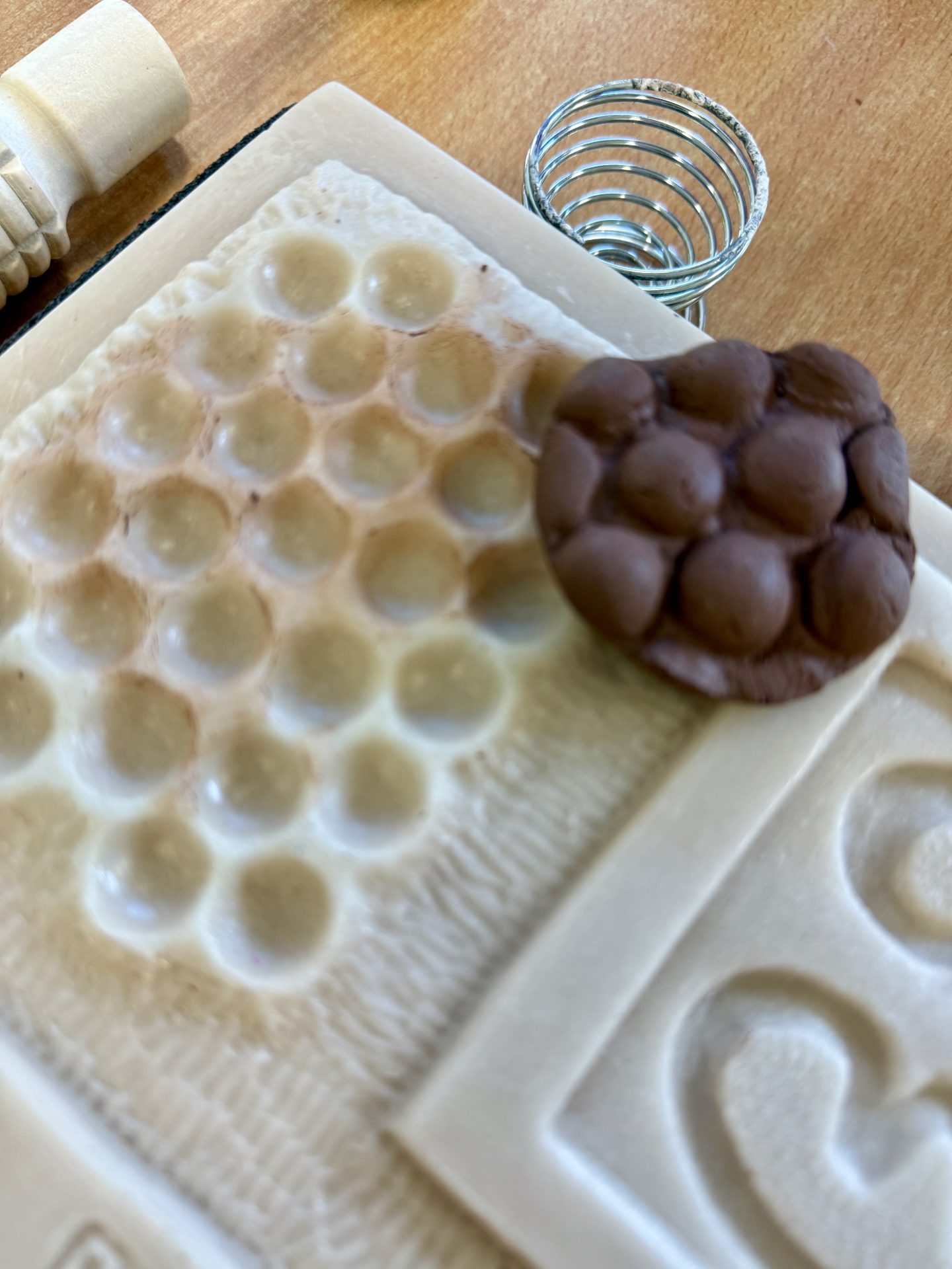 Image of a clay imprint from a tile